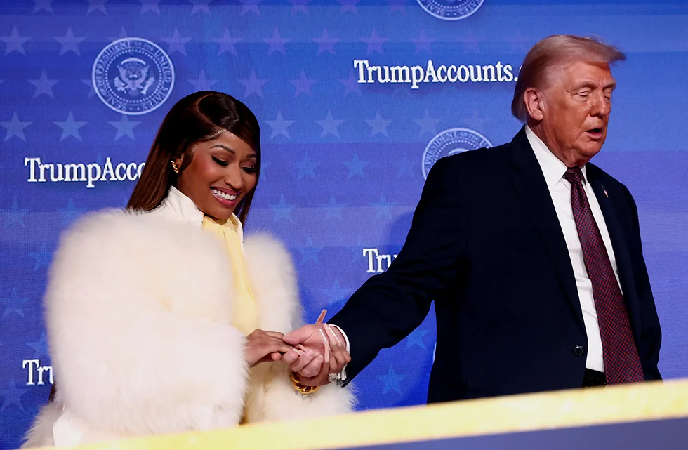 President Donald Trump and musician Nicki Minaj hold hands onstage at the U.S. Treasury Department's Trump Accounts Summit, in Washington, D.C., Jan. 28, 2026.
Kevin Lamarque, REUTERS