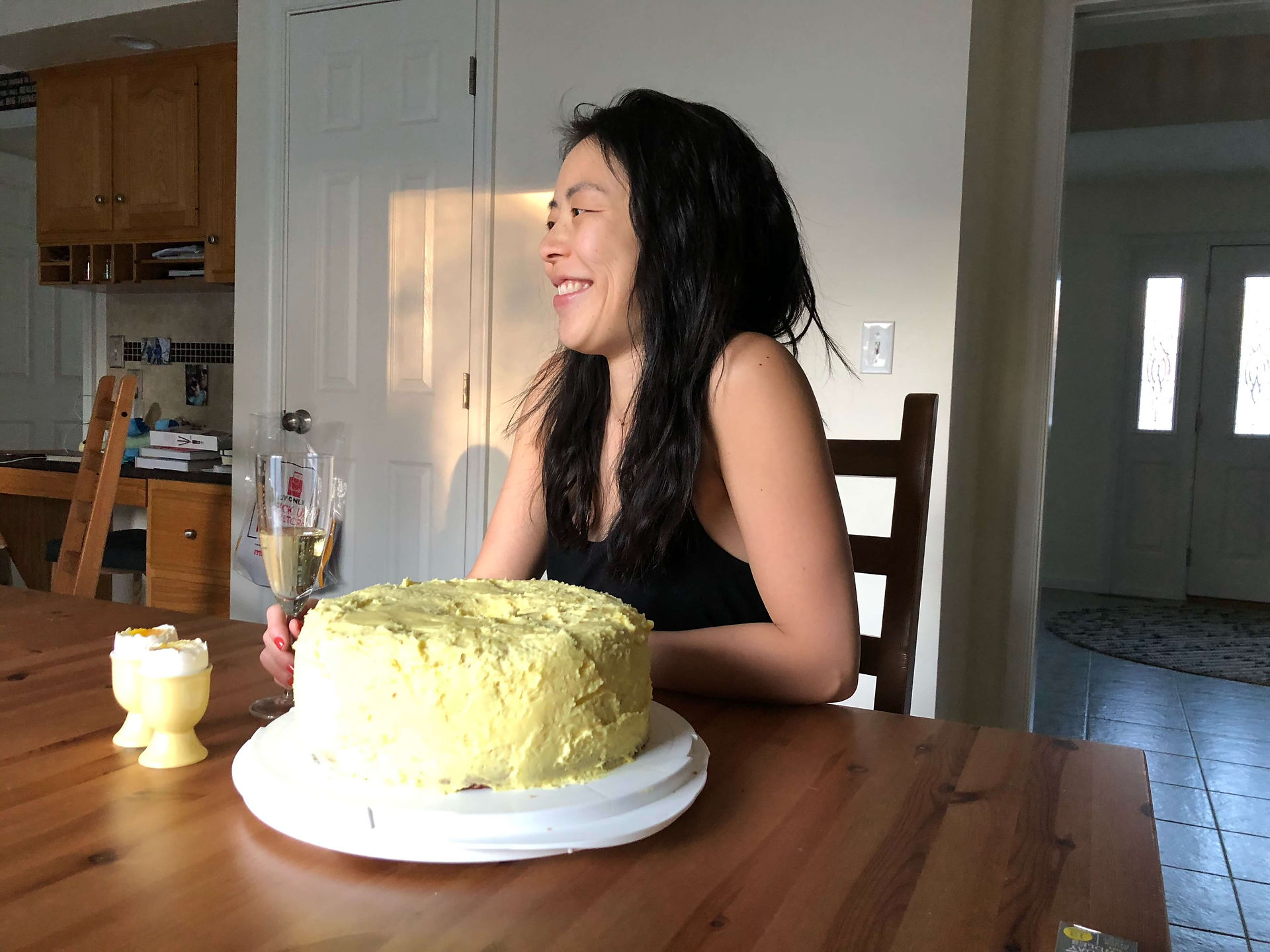Jennifer smiling with her birthday cake