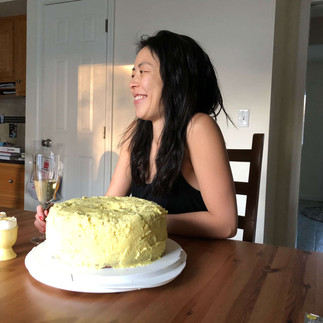 Jennifer smiling with her birthday cake