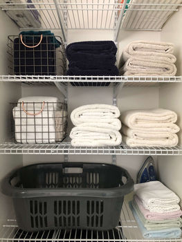 folded towels in closet