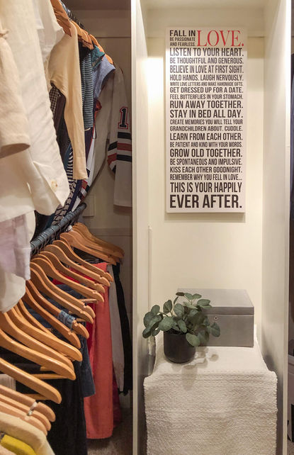 closet spruce up with wall art and faux greenery