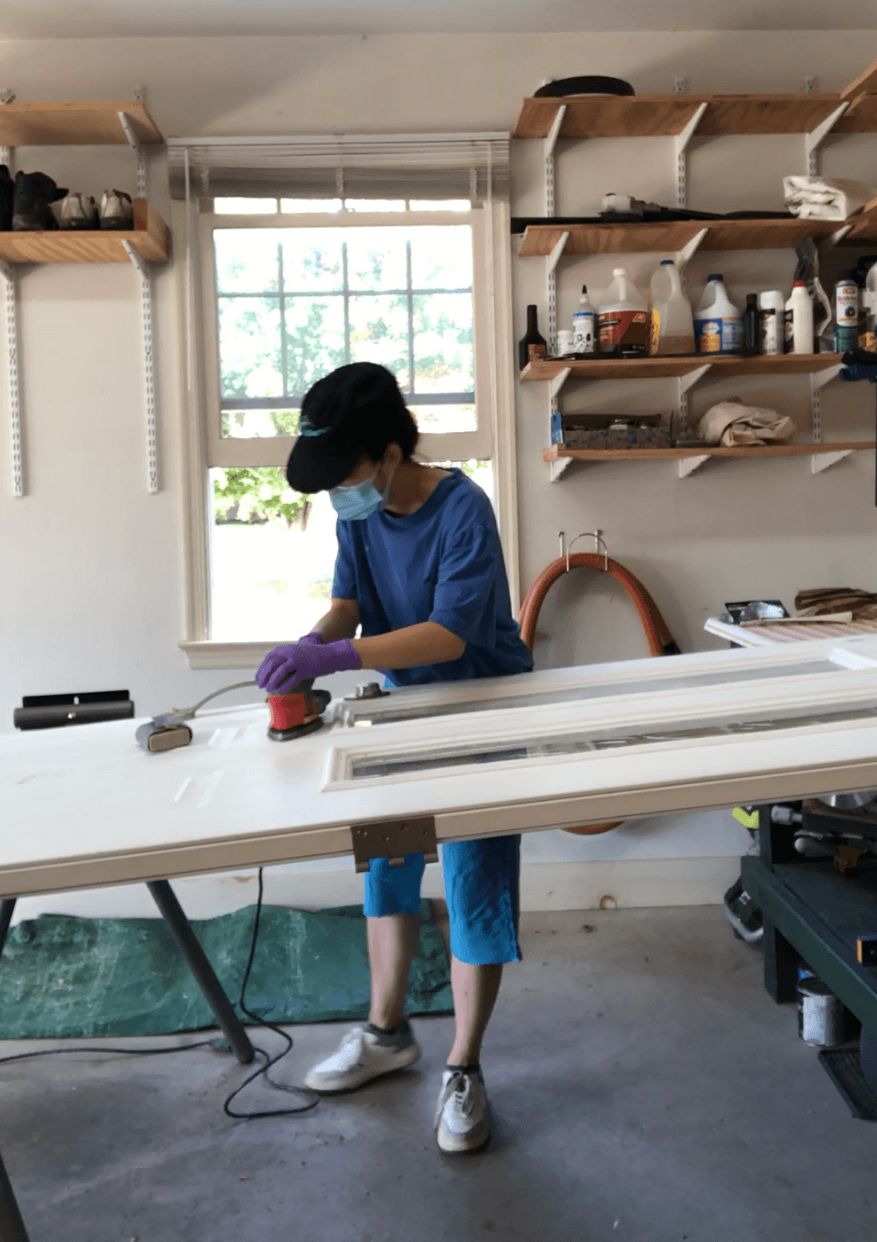 Jennifer sanding white front door