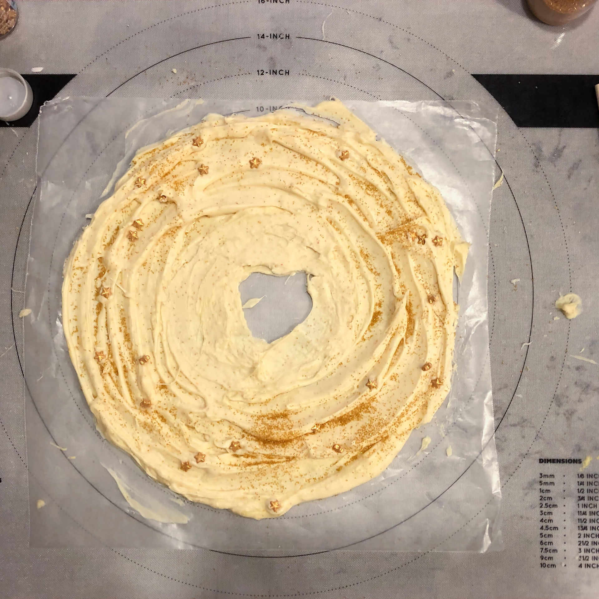 melted white chocolate and gold sprinkles