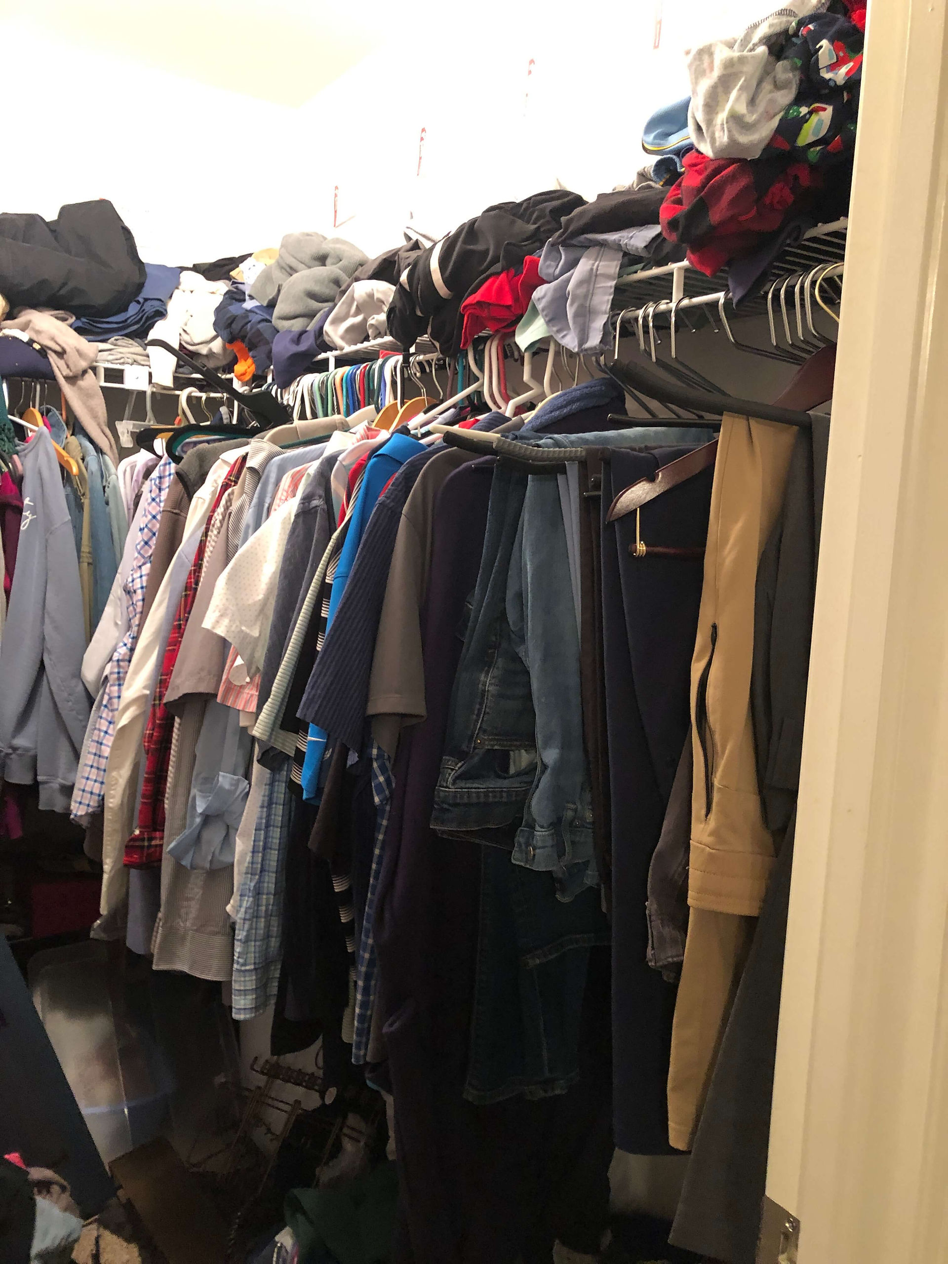 clothes crammed in closet