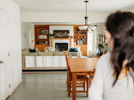 Jennifer looking back towards her well designed and organized family room