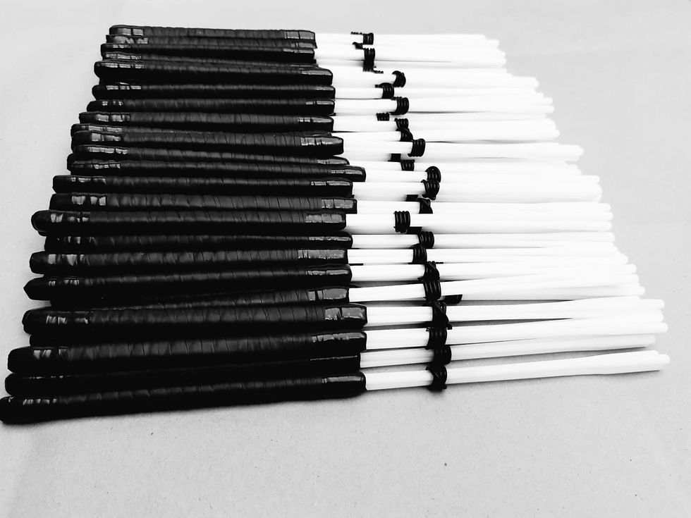 Thumbnail: Black handled, white pronged tamborim beater by Japa.