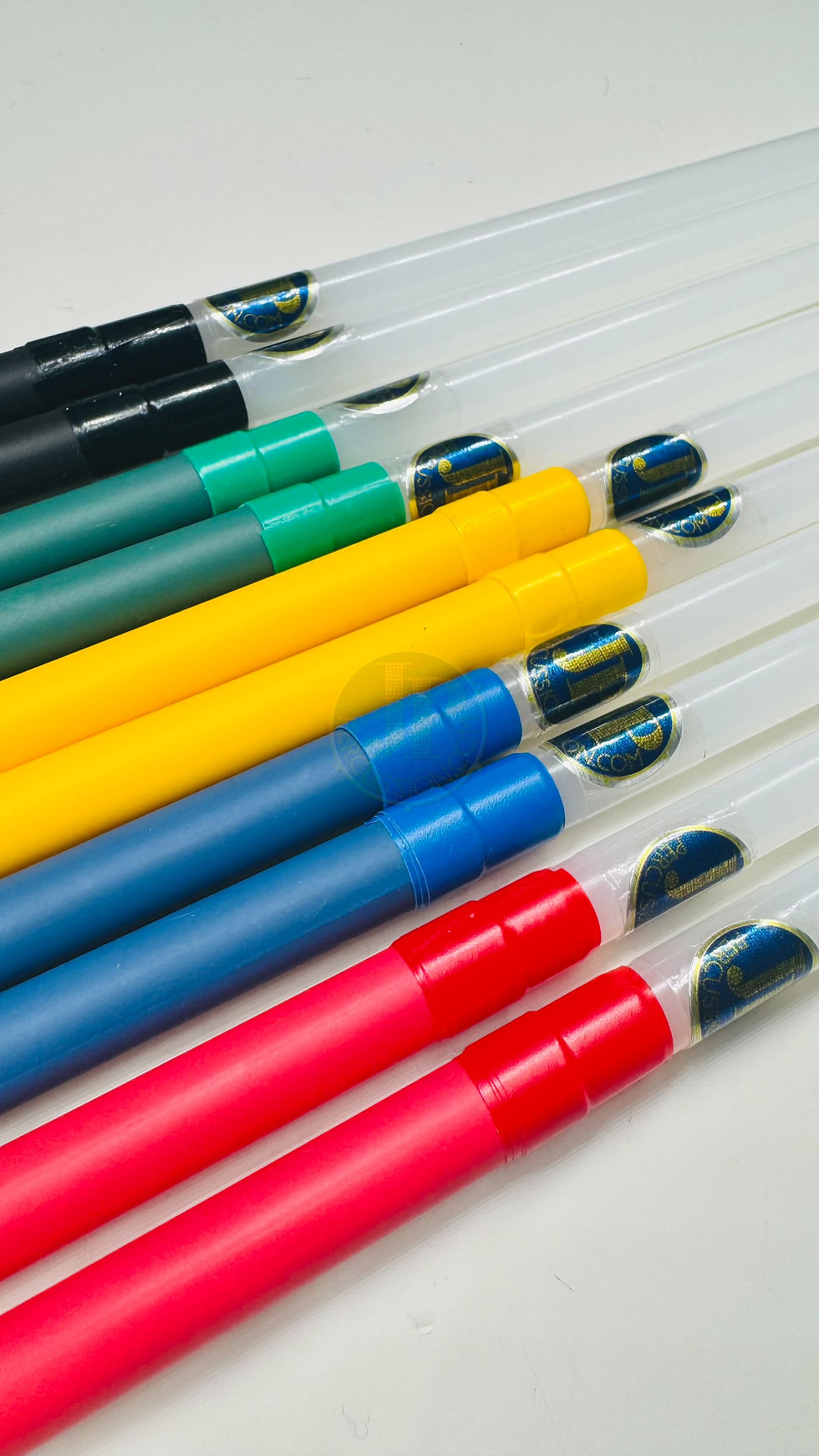 close up on handles and logos on JP Percussion Whippy Sticks, Flexible nylon rods for playing percussion instruments.