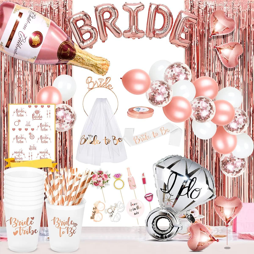 Pink bridal shower decor with BRIDE balloons, Bride to Be dress, I do balloon, rose-gold fringe, and Bride Tribe cups ու?