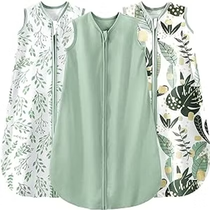Three sleeveless zip-front vests in mint green and white with leafy botanical prints, displayed side by side.