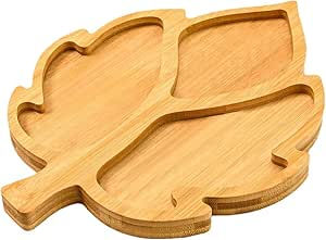 Wooden leaf-shaped tray with three compartments, light brown color, on a white background. No text or additional objects visible.