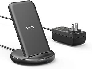 Black Anker wireless charging stand with a cable and plug adapter on a white background. Text reads "ANKER" on the stand.