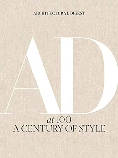 Architectural Digest magazine cover with large AD, text at 100 A Century of Style on a beige background.