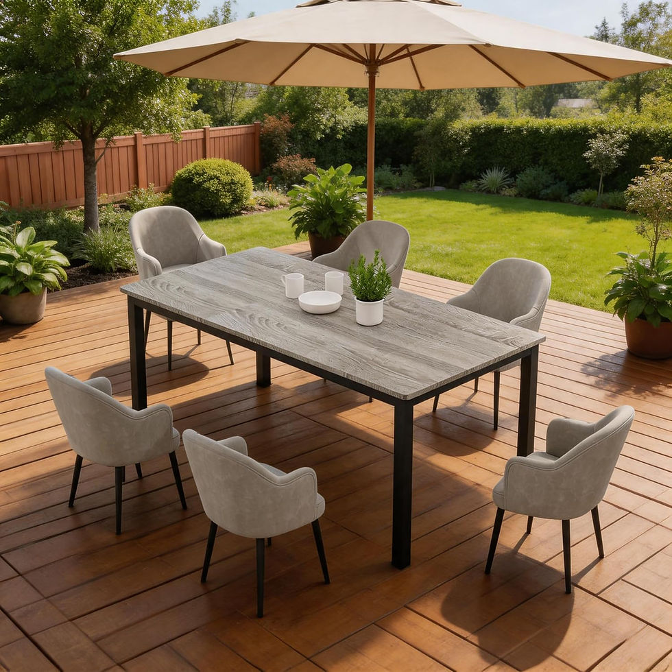 Sunlit backyard patio with six beige chairs around a gray dining table under a large umbrella, beside a green lawn.