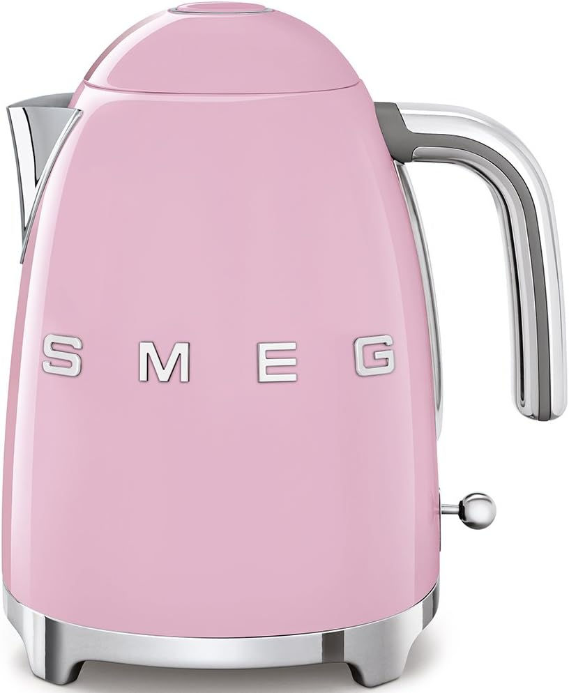 Pink SMEG electric kettle with chrome accents and handle, set on a white background. Smooth, glossy finish and retro design.