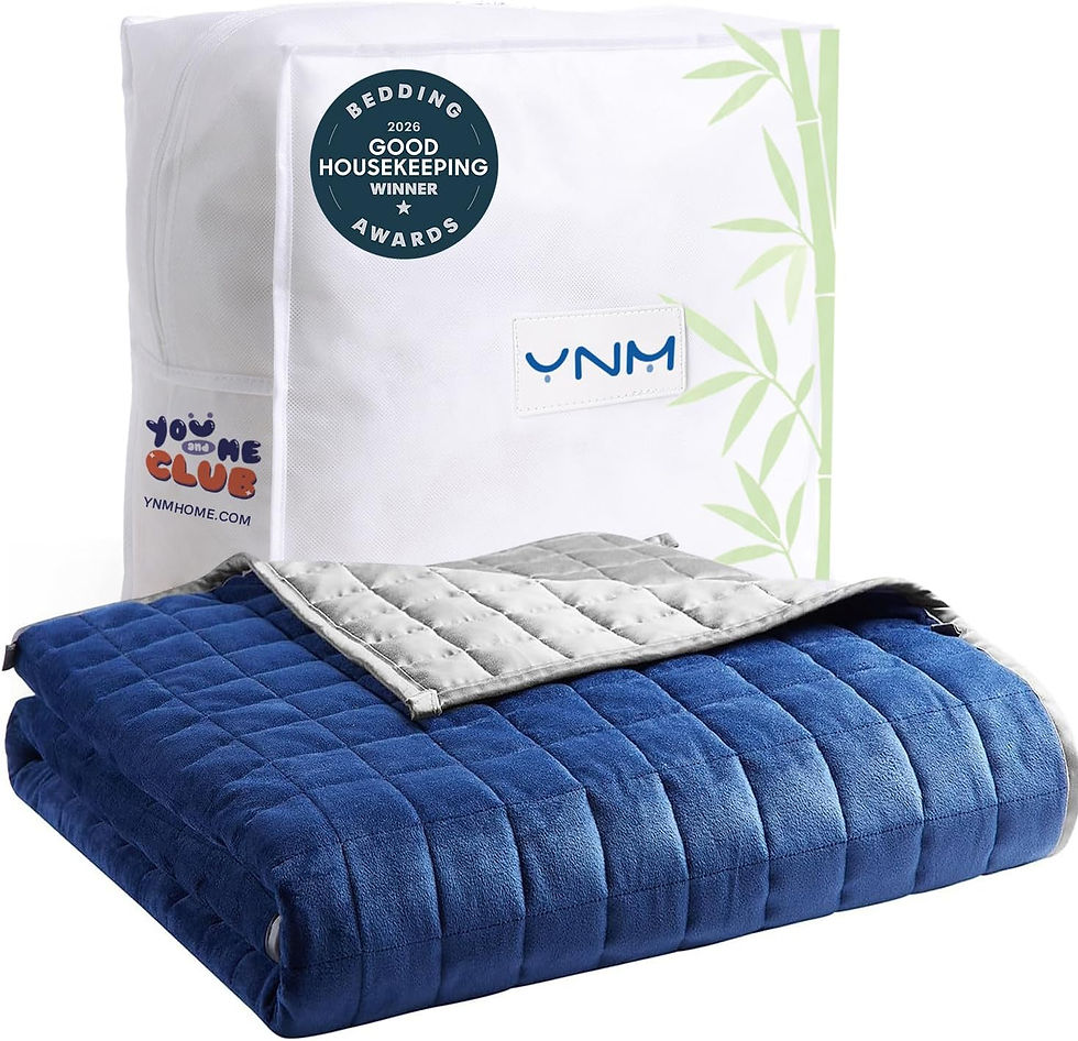Blue quilted blanket folded in front of a white YNM bedding package with Good Housekeeping Winner badge and bamboo print.