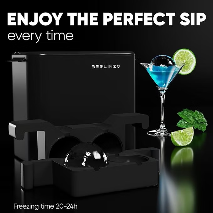 Black Berlino ice mold with frozen sphere beside a blue cocktail, lime and mint on black background; text: ENJOY THE PERFECT SIP