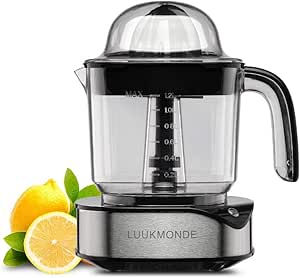 Electric citrus juicer by Luukmonde with a transparent container, black handle, next to whole and sliced lemons. Modern and sleek design.