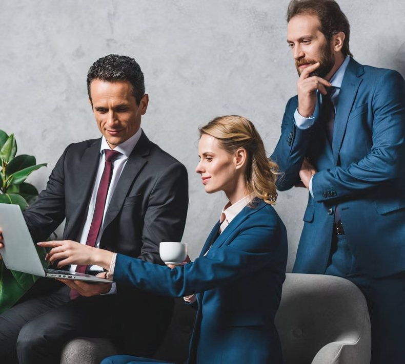 stock-photo-colleagues-using-laptop-toge.png