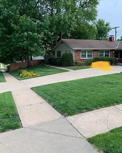 A freshly cut green lawn handled by Zerr Management LLC, a full service lawn care company that operates in Lawrence Kansas and performs other services
