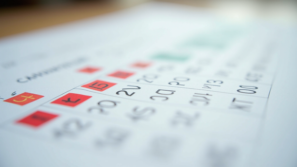 Eye-level view of a calendar with time blocks marked in different colors