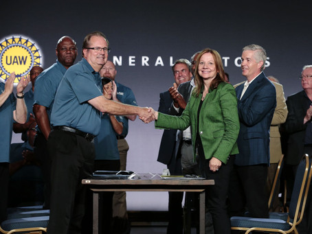 UAW members approve labor deal to end strike with GM; union selects Ford next