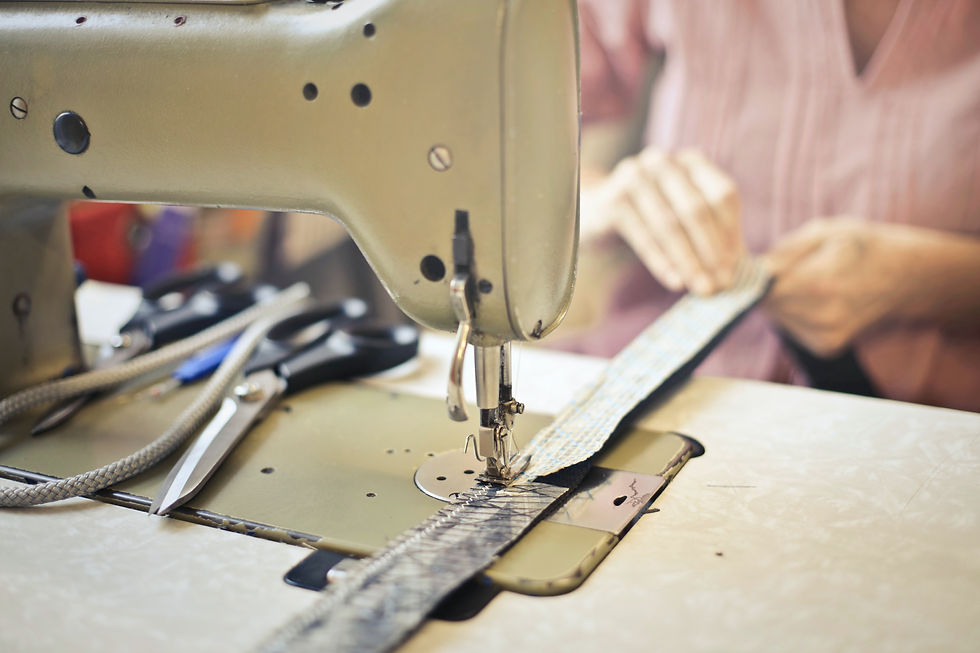 seamstress-stitching-clothing-item-on-se