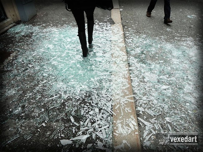 bomb shrapnel broken pains of glass | streets full of glass shards