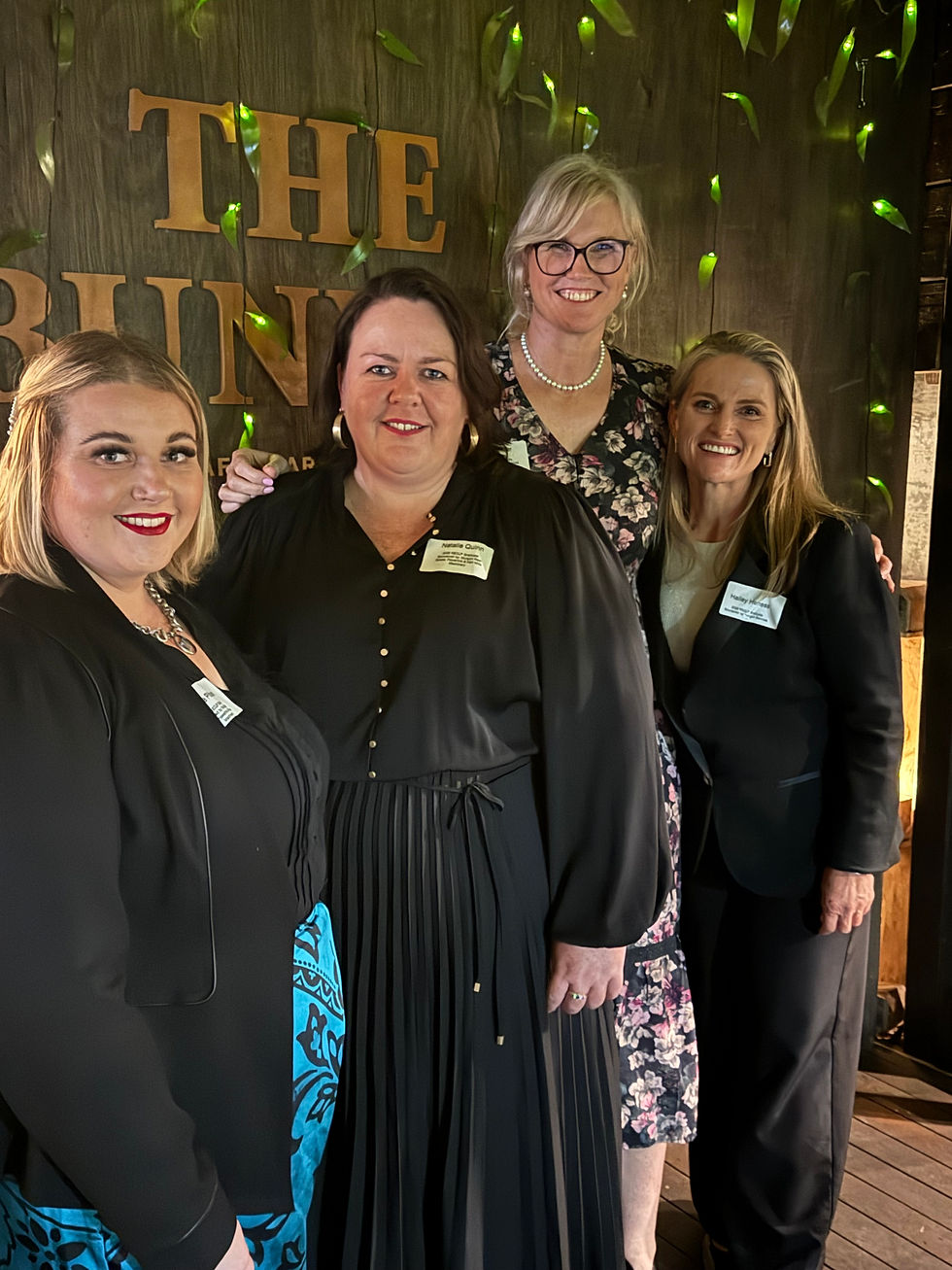 Four women at Leadership Program Graduation