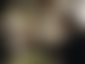 elderly artist painting at easel representing human taste and experience that artificial intelligence cannot replicate