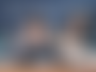 couple in distress at kitchen table with financial documents after being targeted by a scam representing how to report fraud in Canada USA UK and Europe