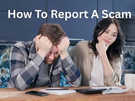 couple in distress at kitchen table with financial documents after being targeted by a scam representing how to report fraud in Canada USA UK and Europe