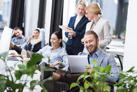 selective-focus-of-young-smiling-business-people-a-2023-11-27-05-37-24-utc-min.jpg
