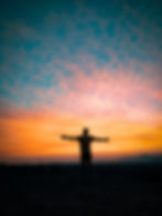 silhouette-man-standing-field-against-sky-sunset.jpg