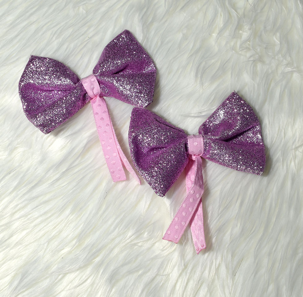 2 petits noeuds roses paillettes