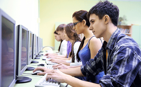 Teenagers working on computers.gif