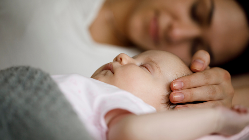 mom and baby resting
