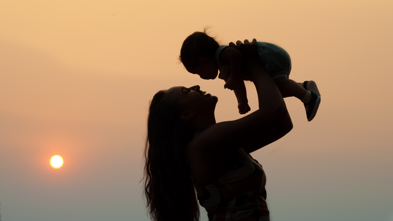 mommy and baby sunset