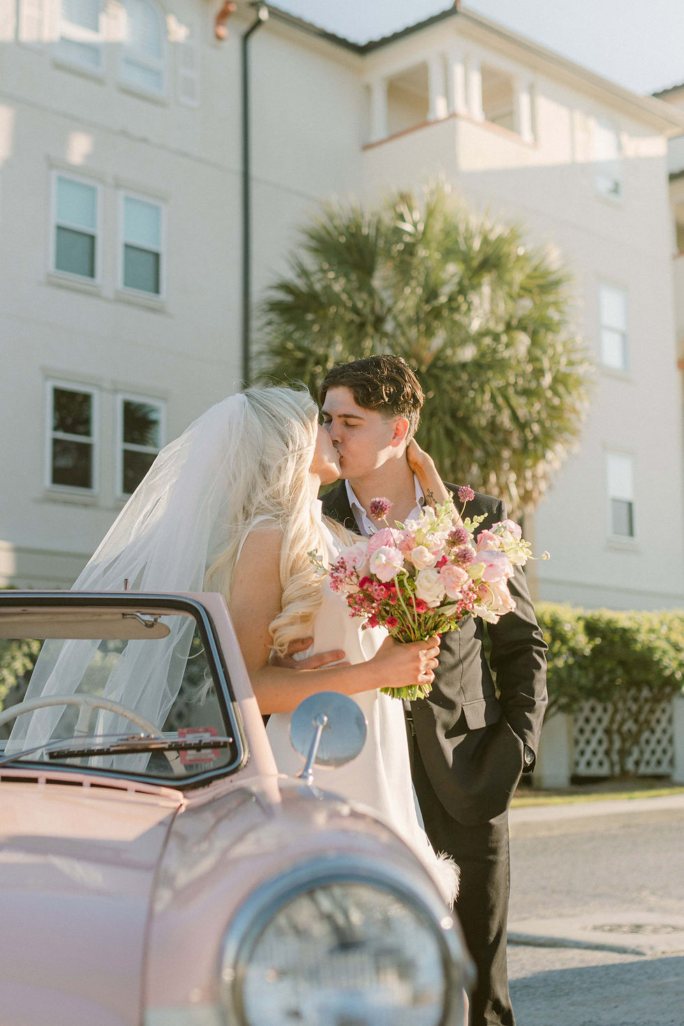 A couple sharing a kiss during their elopement.