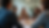 Eye-level view of a group of diverse young leaders engaged in a discussion