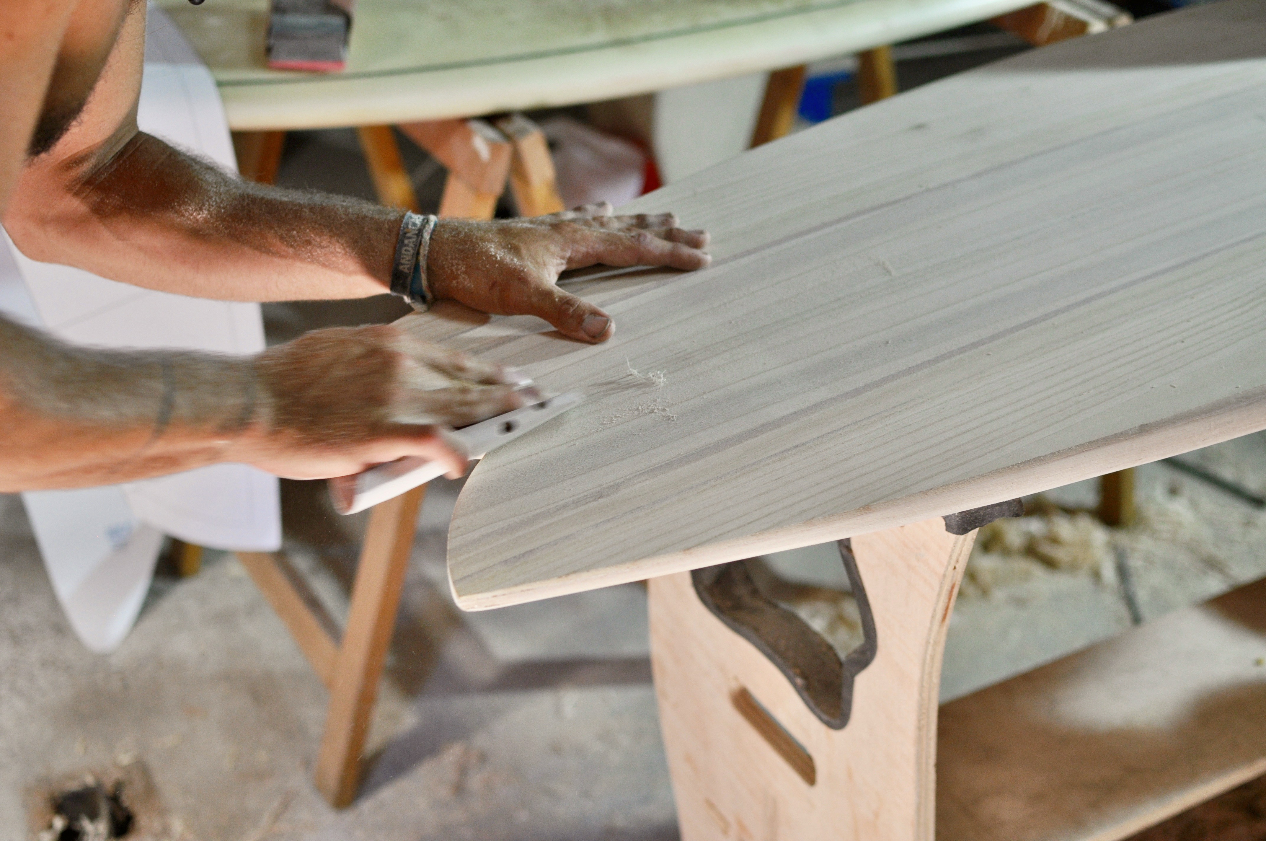 Surf brand with retro-inspired, eco-friendly designs, handmade wooden boards, and workshops.