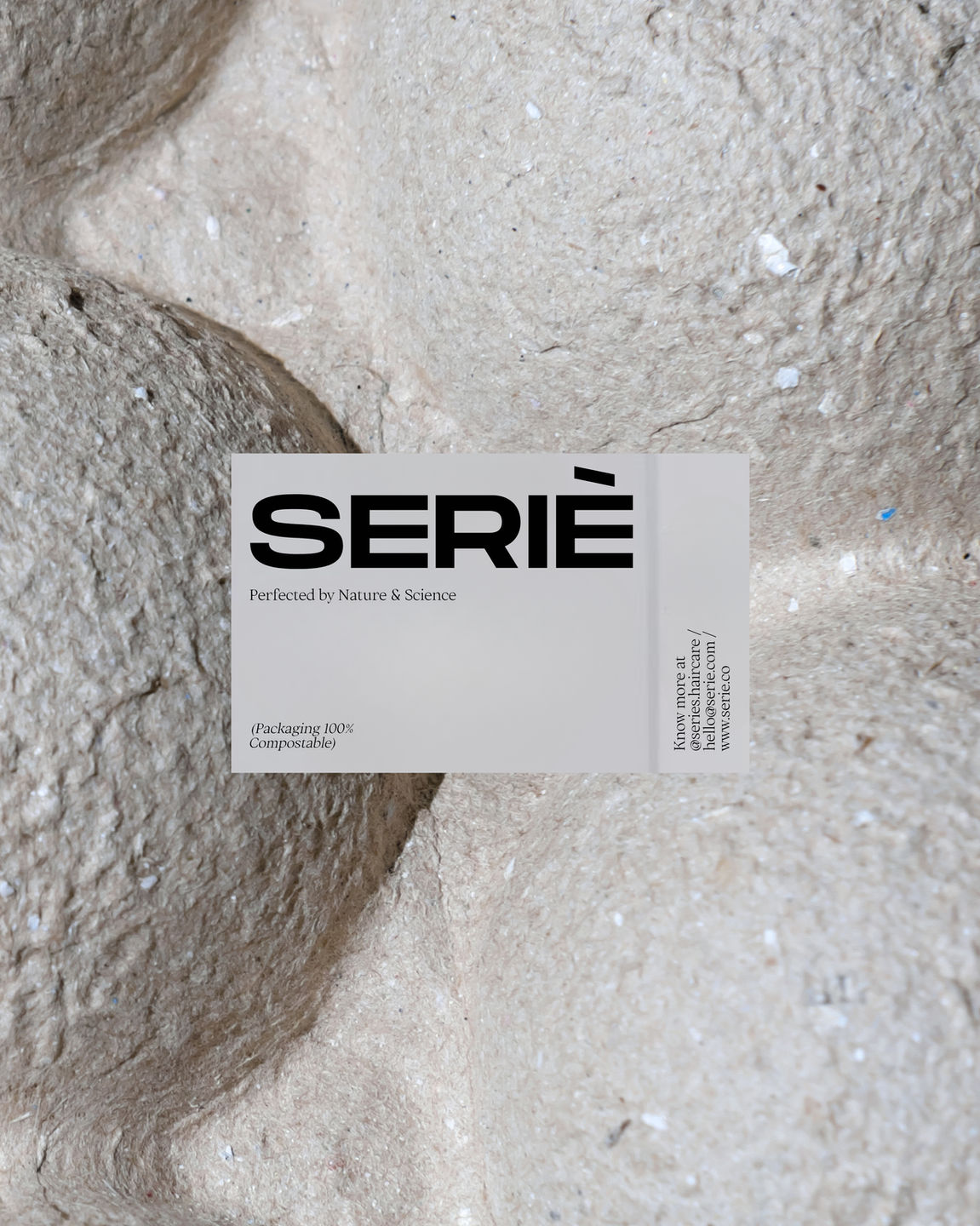 An image showcasing Série, a luxury hair and skincare line. The minimalist packaging features sleek, clean lines and neutral tones, emphasizing sophistication and eco-consciousness. Materials are sustainable, reflecting the brand's commitment to reducing waste. The design embodies the blend of scientific precision and natural ingredients, creating an elegant and modern aesthetic.