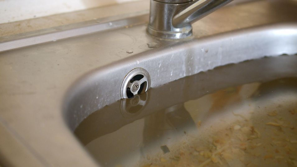 A Blocked Sink Showing The Difference Between a Blocked Drain and Collapsed Drain