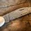 Miniaturbild: Damastmesser auf Holztisch