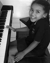 Piano Prodigy student learning to play piano