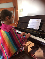 Piano Prodigy Music student learns to play piano