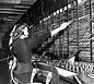 image of telephone operator working on a switchboard circa 1950s