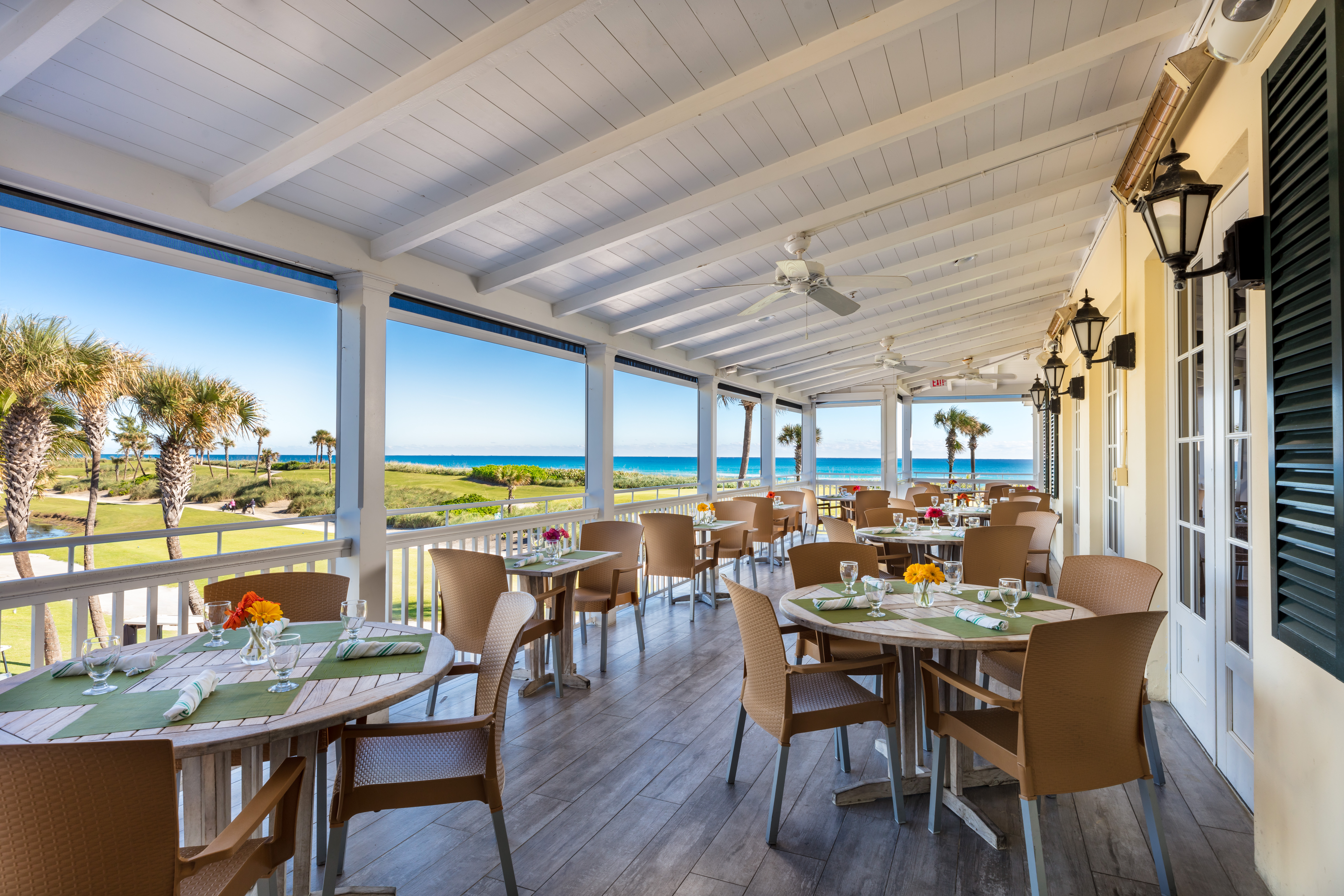 Al Fresco’s covered terrace overlooking the ocean and Palm Beach Par 3