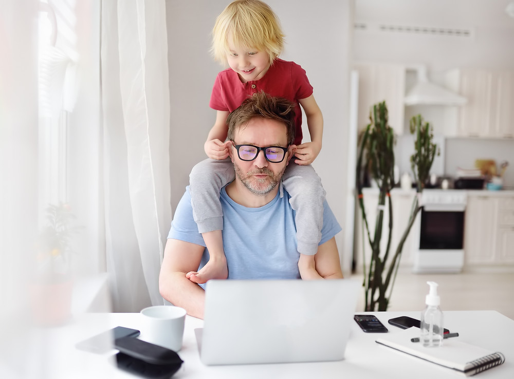 Father working from home & parenting at the same time