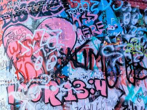 Spray paint graffiti on a wall