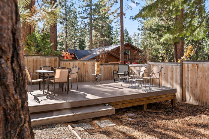 Our backyard is fully fenced in and set up for a family meal outdoors and an exciting game of Jenga. (backyard not accessible in winter months)